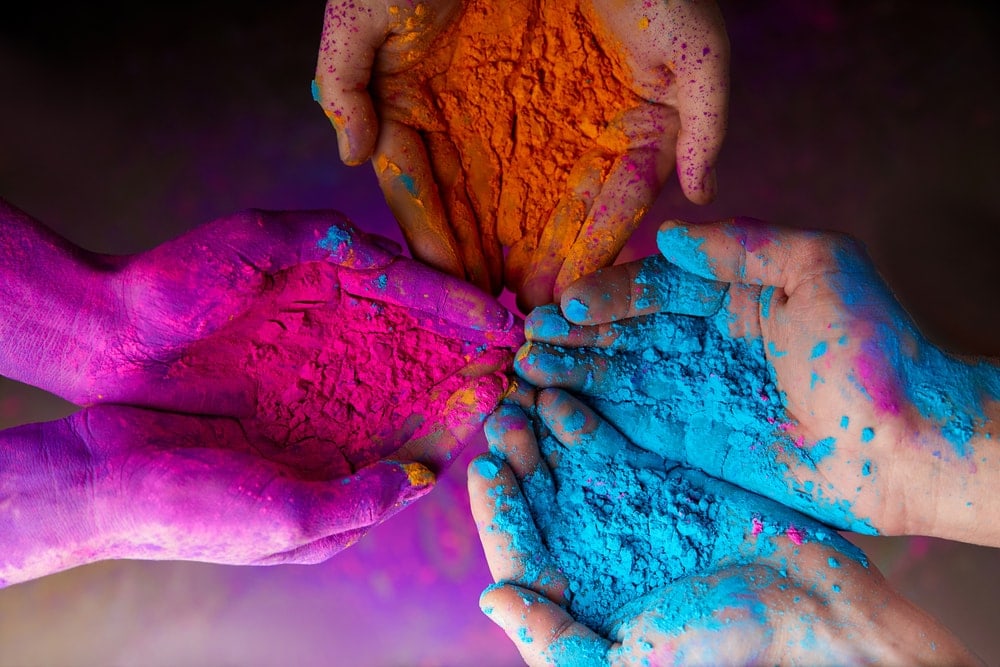 colored hands celebrating holi